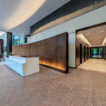 3 Ravinia Virtual Tour: Main Lobby – Security Desk & Elevator Banks